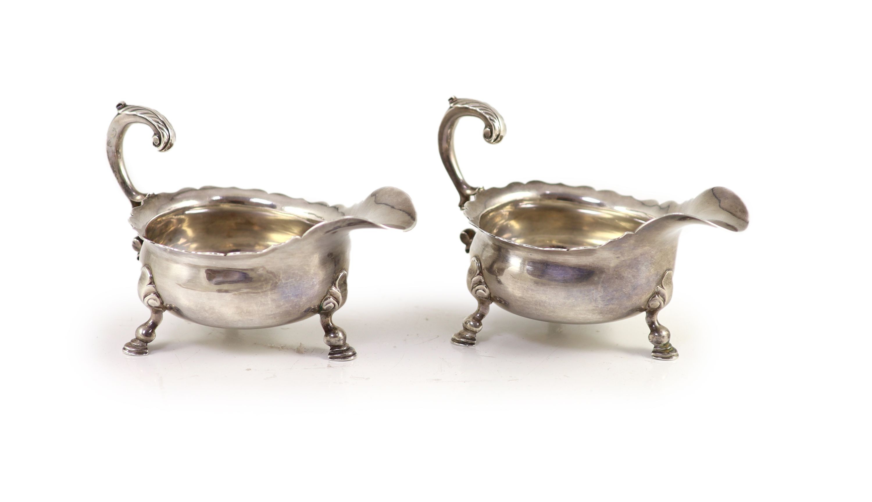 A pair of George II silver sauceboats, by Henry Brind
